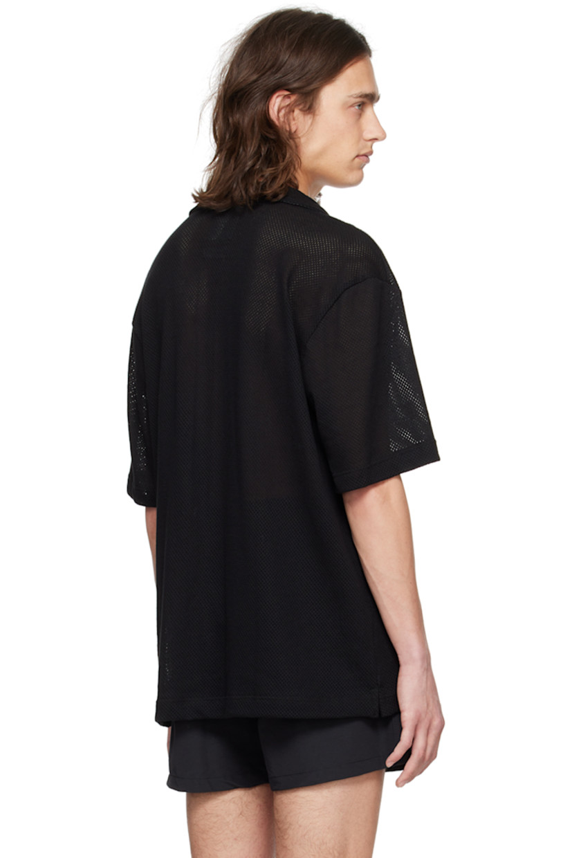 OEKO-TEX® Standard 100-certified cotton mesh shirt. Lightweight and breathable. 

· Open spread collar
· Button closure
· Patch pocket at chest
· Vented side seams 

Supplier color: Black