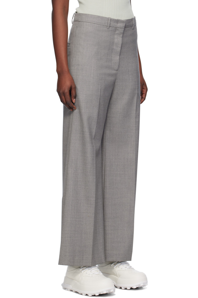 Wide-leg wool-blend twill trousers.

· Belt loops
· Four-pocket styling
· Zip-fly
· Pleats at front
· Creased legs
· Unlined
 
Supplier color: Melange grey