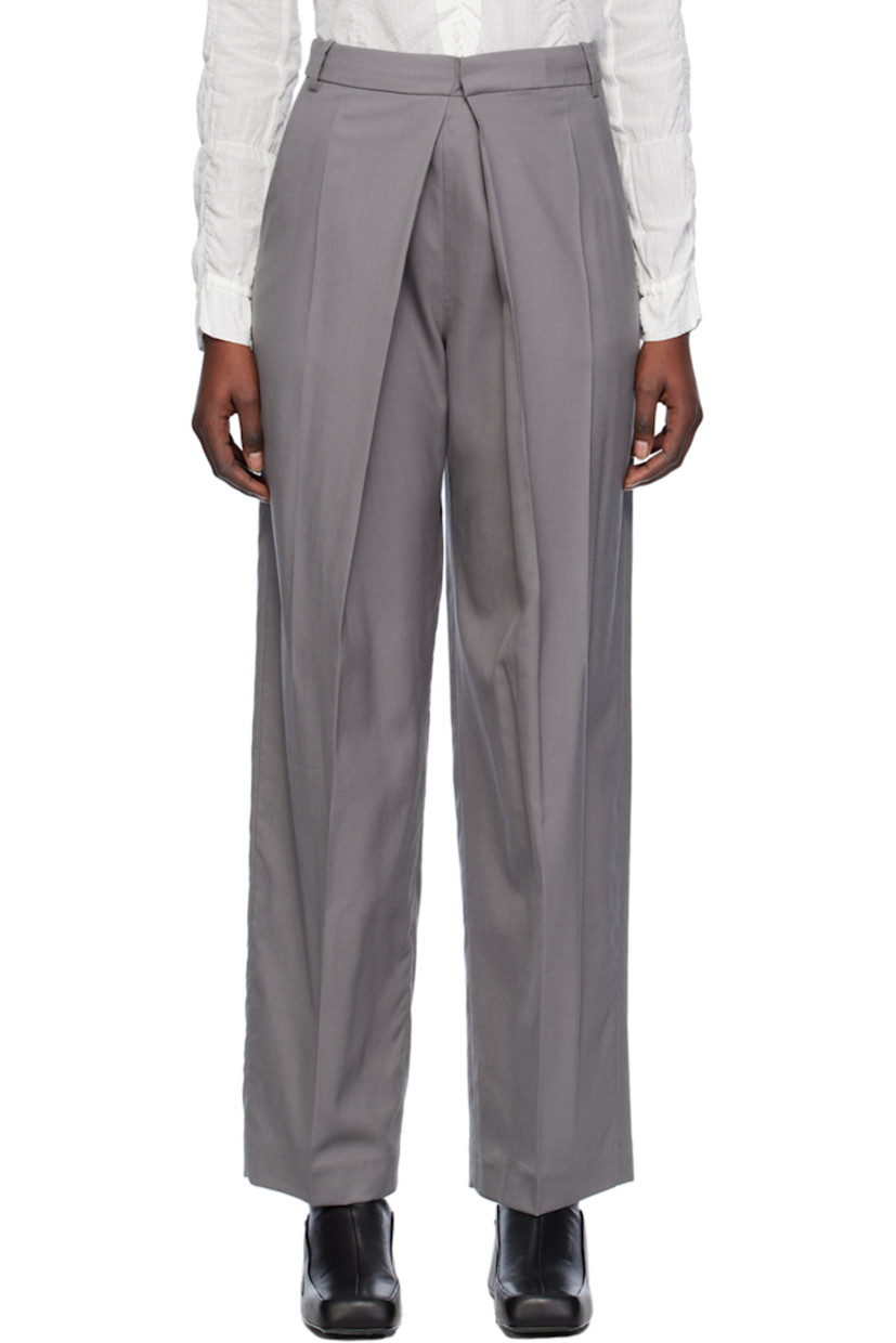 Wide-leg wool delaine trousers.

· Belt loops
· Four-pocket styling
· Concealed offset zip-fly
· Creases and pleats at legs

Supplier color: Grey