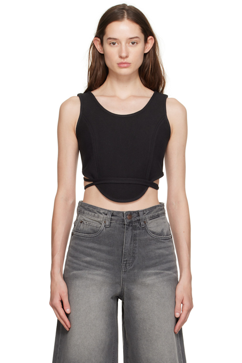 Cotton- and nylon-blend cloqué tank top.

· Front-to-back reversible construction
· Crewneck
· Princess seams
· Logo embroidered at front
· Wraparound self-tie strap at waist
· Curved hem

Supplier color: Black