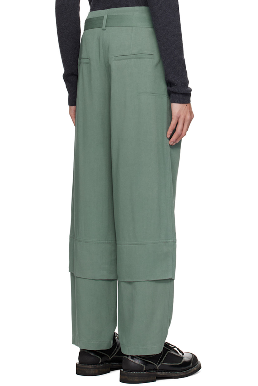 Rayon- and modal-blend twill cargo pants.

· Integrated cinch belt and belt loops at waistband
· Detachable flap pockets at belt
· Two-pocket styling
· Zip-fly
· Pleats at front legs
· Layered cuffs
· Patch pocket at outseams

Supplier color: Green