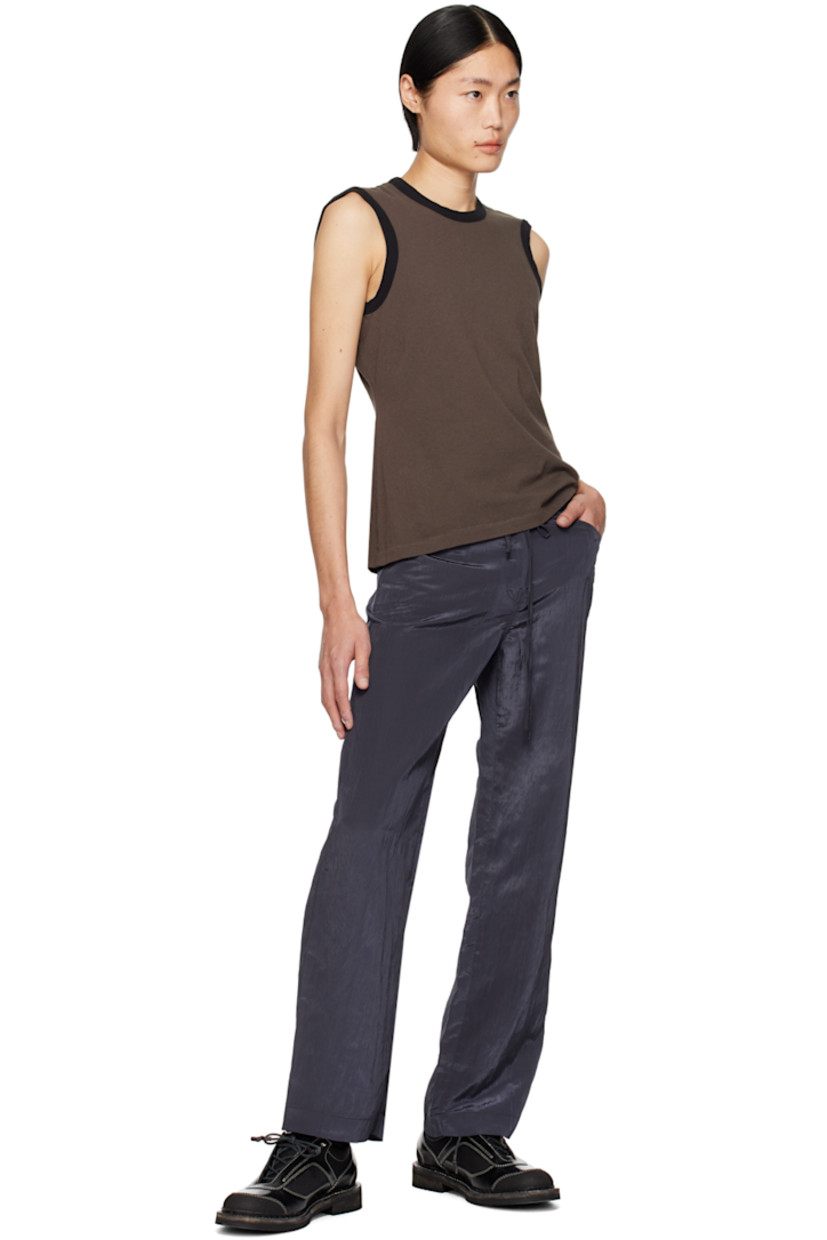 Crinkled polyester- and nylon-blend taffeta trousers.

· Self-tie belt and belt loops at waistband
· Five-pocket styling
· Zip-fly

Supplier color: Navy