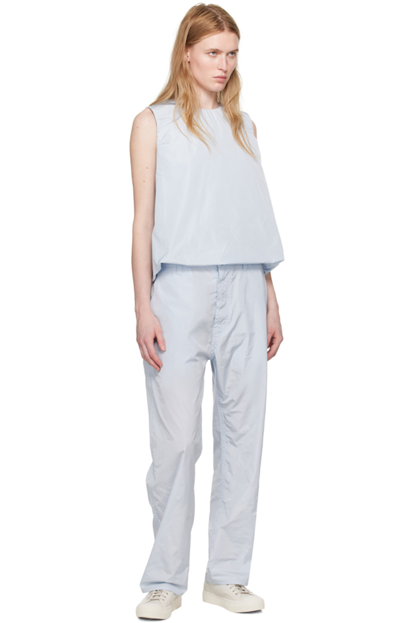 Polyester taffeta trousers.

· Belt loops
· Four-pocket styling
· Button-fly

Supplier color: Ice