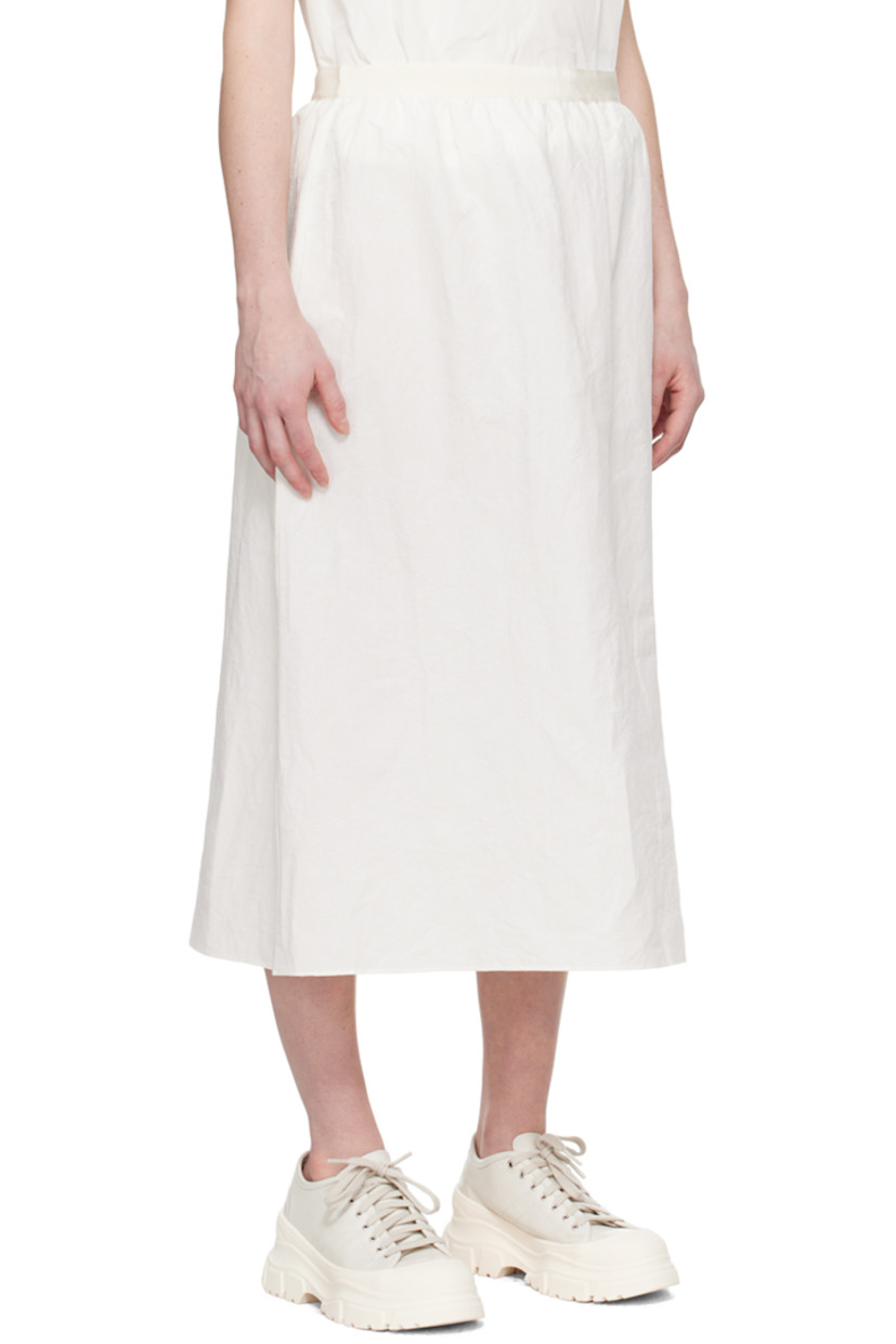 Plain-woven crinkled linen -and cotton-blend skirt.

· Gathering at waist
· Two-pocket styling
· Concealed zip closure at back
· Central vent at back hem

Supplier color: Milk