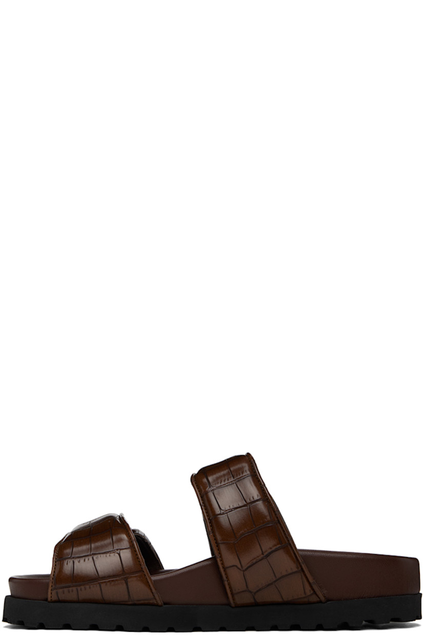 Croc-embossed faux-leather flat sandals in brown.

· Open toe
· Padded velcro straps at vamp
· Logo embossed at molded footbed
· Foam rubber midsole
· Treaded rubber sole

Supplier color: Chocolate