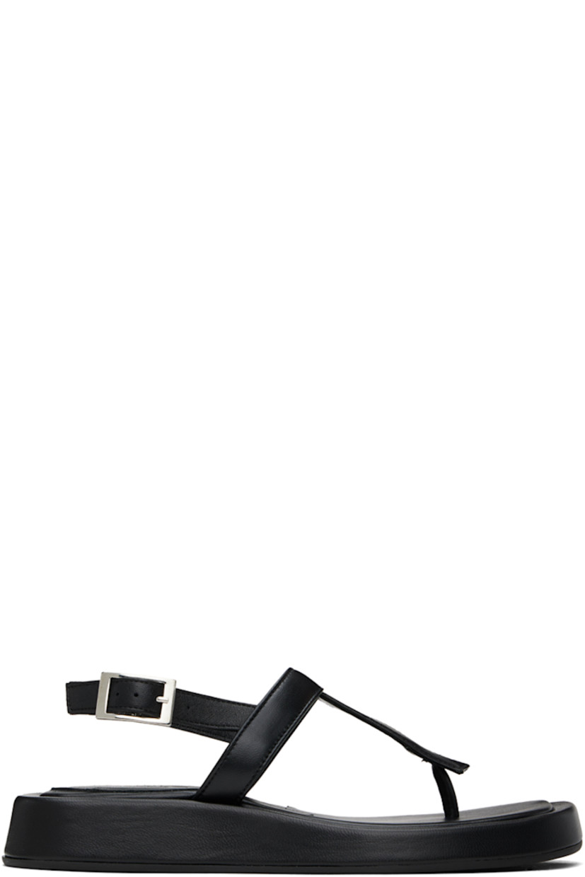 Grained leather flat sandals in black.

· Open square toe
· Thong-style strap at vamp
· Pin-buckle ankle strap
· Logo embossed at padded footbed
· Covered midsole
· Rubber sole

Supplier color: Black