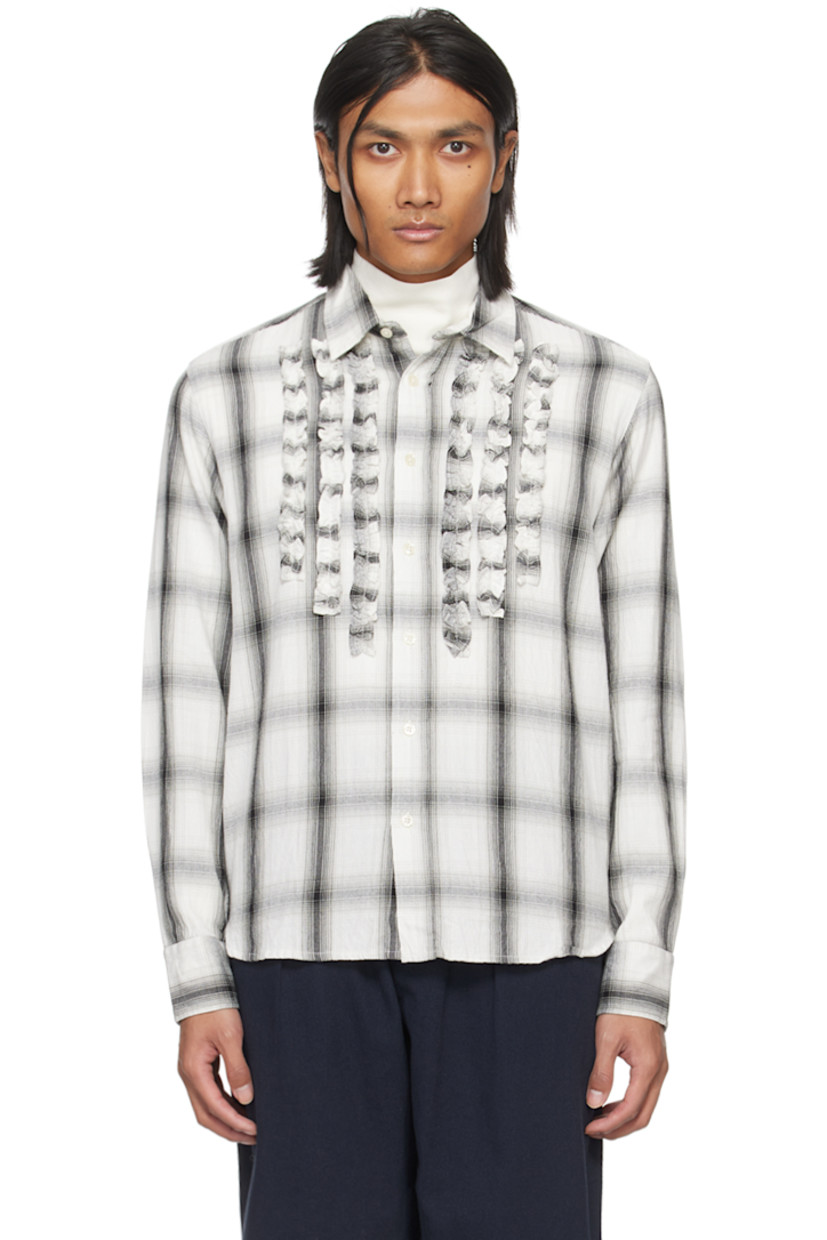 Cotton dobby cloth shirt. Check pattern throughout.

· Spread collar
· Button closure
· Ruffled trim at front
· Shirttail hem
· Adjustable single-button barrel cuffs
· Box pleat at back yoke

Supplier color: Ecru