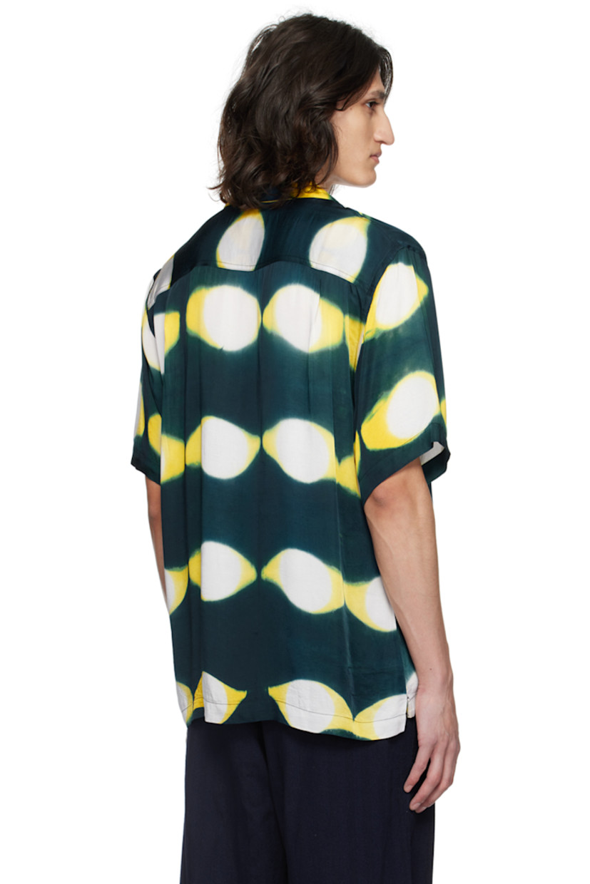 Plain-woven modal shirt. Hand-dyed graphic pattern throughout.

· Open spread collar
· Button closure
· Patch pocket at chest
· Tennis-tail hem

Each item is unique. Please note that coloration may vary.

Supplier color: Navy/Yellow