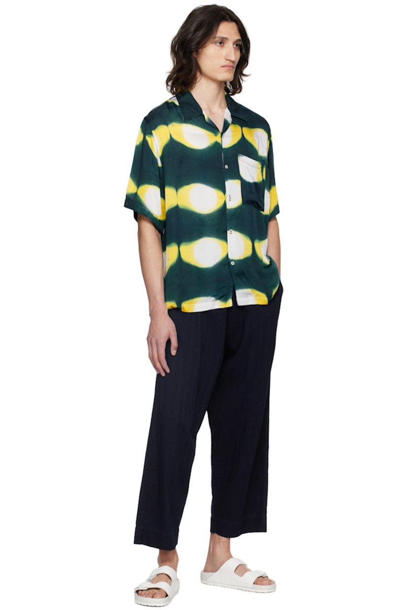Plain-woven modal shirt. Hand-dyed graphic pattern throughout.

· Open spread collar
· Button closure
· Patch pocket at chest
· Tennis-tail hem

Each item is unique. Please note that coloration may vary.

Supplier color: Navy/Yellow