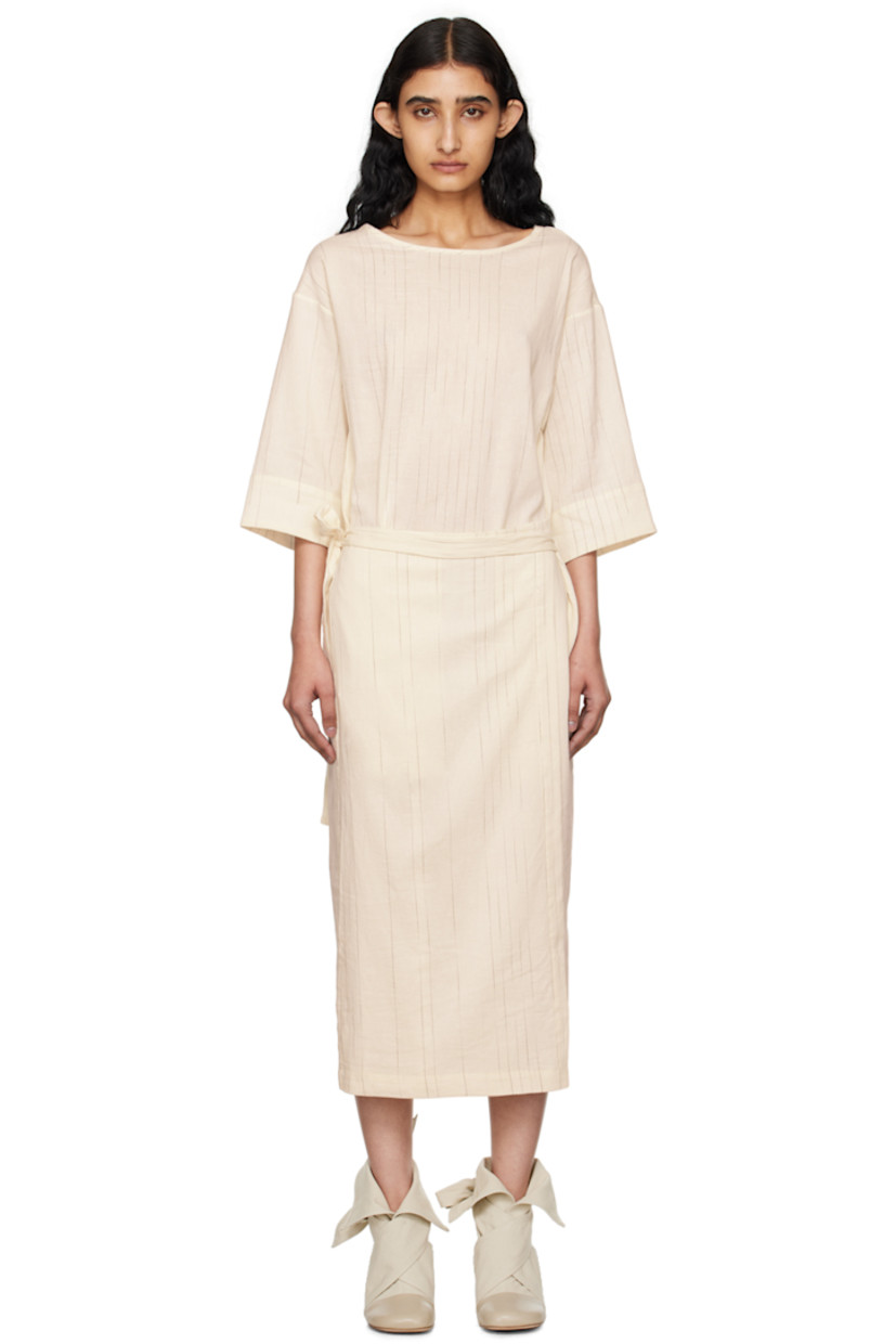 Cotton- and linen-blend twill dress. Stripes throughout.

· Wrap construction
· Crewneck
· Self-tie fastening at waist
· Seam pockets
· Cutout and partially elasticized trim at back
· Unlined

Supplier color: Fading stripe raw