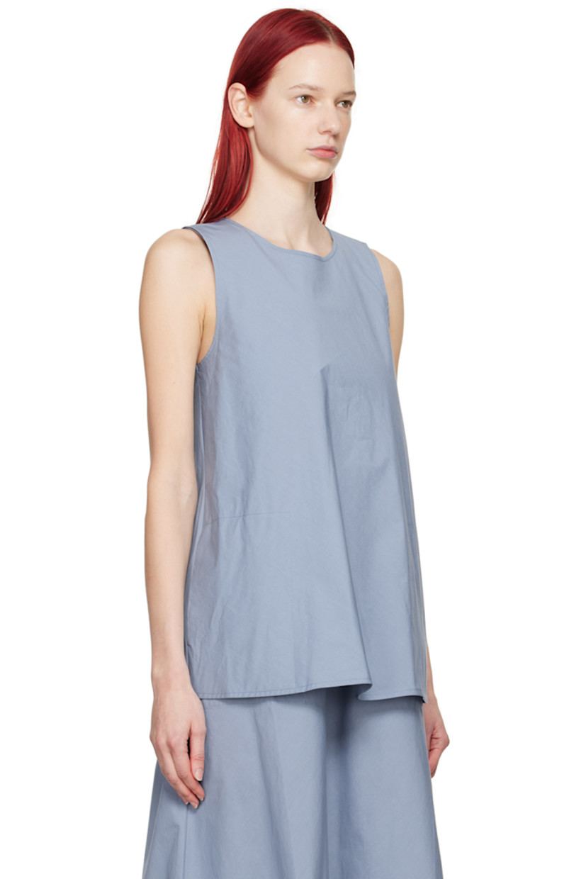 Cotton poplin tank top

· Criss-crossed construction
· Scoop neck
· Seam pockets

Supplier color: Lw textured cotton