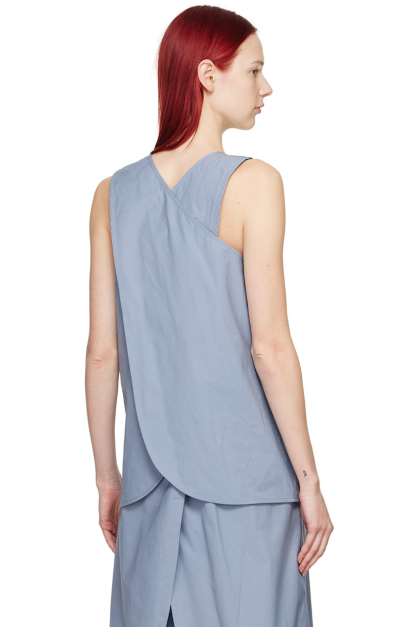 Cotton poplin tank top

· Criss-crossed construction
· Scoop neck
· Seam pockets

Supplier color: Lw textured cotton