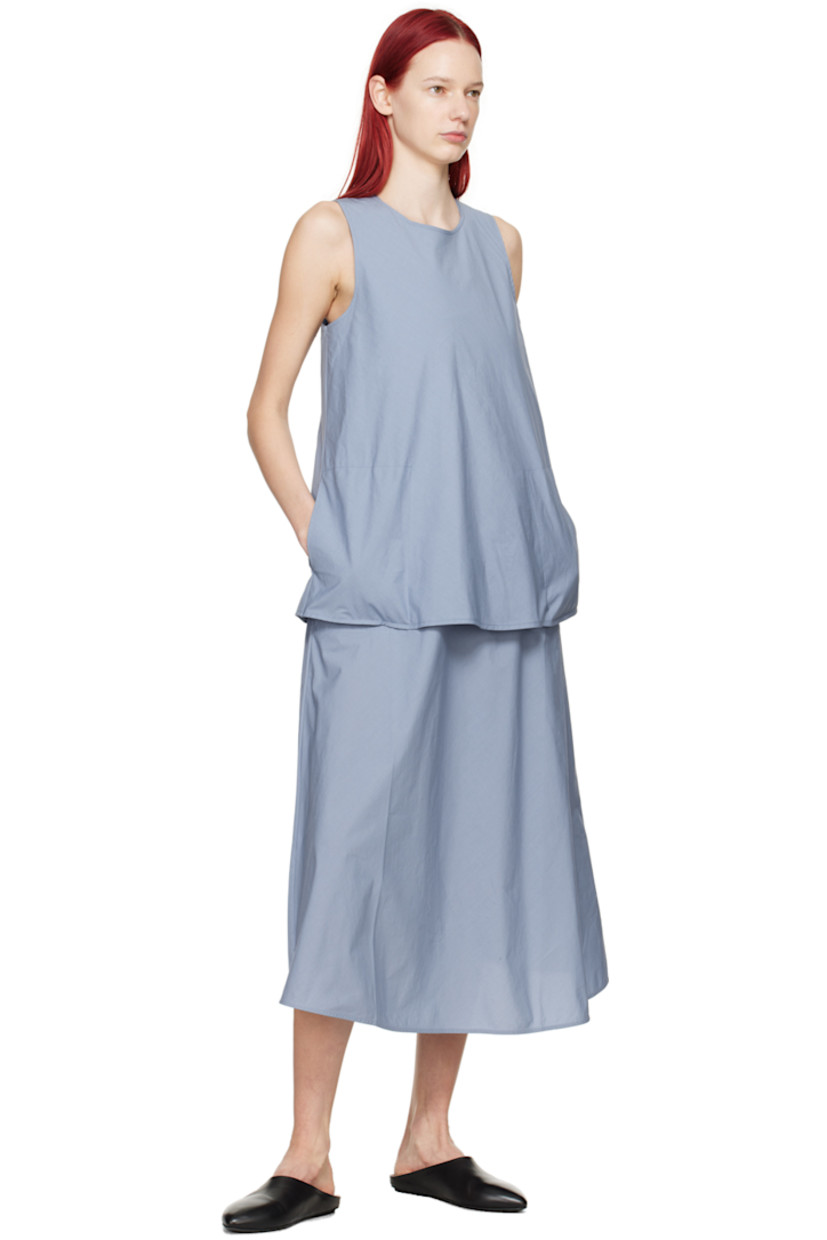 Cotton poplin tank top

· Criss-crossed construction
· Scoop neck
· Seam pockets

Supplier color: Lw textured cotton