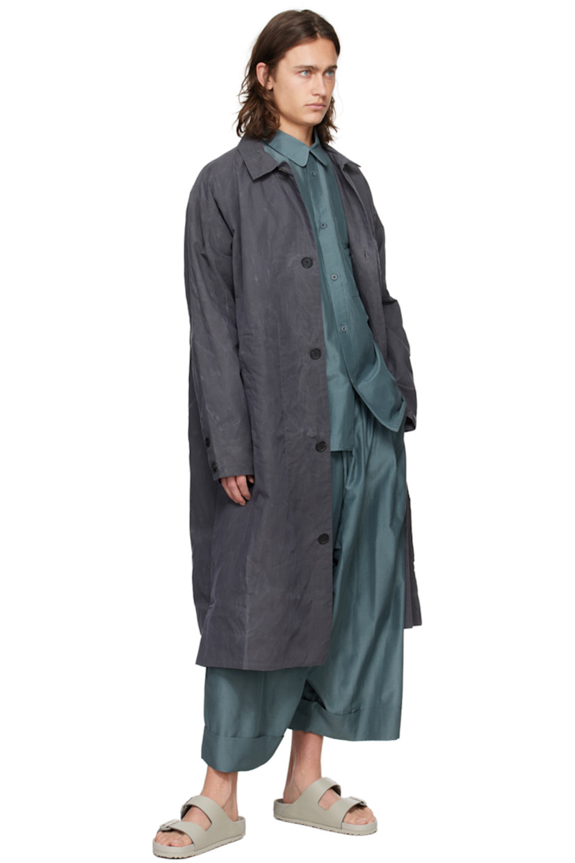 Lightweight plain-woven cotton- and silk-blend shirt. 

· Spread collar
· Button closure
· Patch pocket
· Shirttail hem
· Dropped shoulders
· Inverted box pleat at back yoke 

Supplier color: Lead