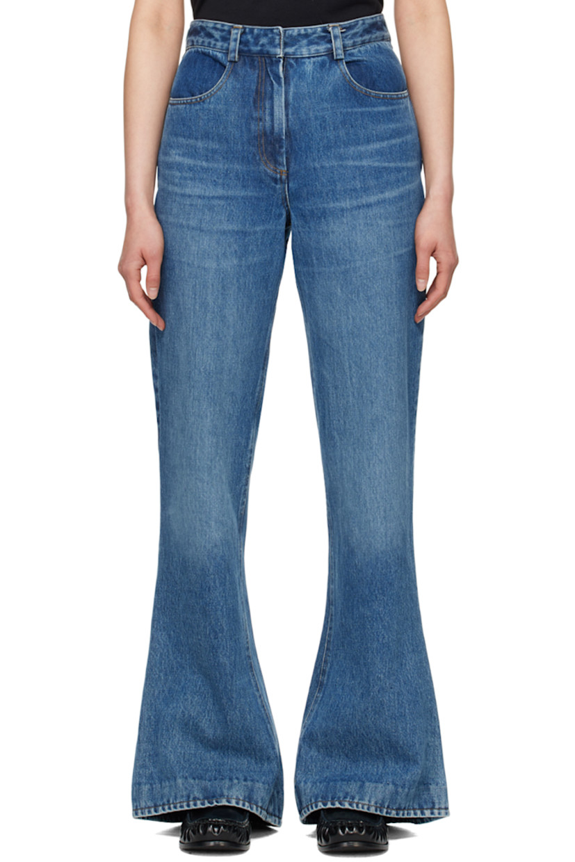 Flared non-stretch denim jeans. Fading and whiskering throughout.

· Belt loops
· Four-pocket styling
· Zip-fly
· Contrast stitching in tan

Supplier color: Blue wash