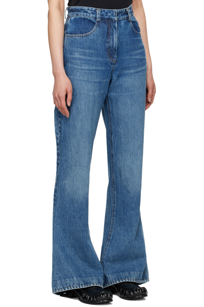 Flared non-stretch denim jeans. Fading and whiskering throughout.

· Belt loops
· Four-pocket styling
· Zip-fly
· Contrast stitching in tan

Supplier color: Blue wash