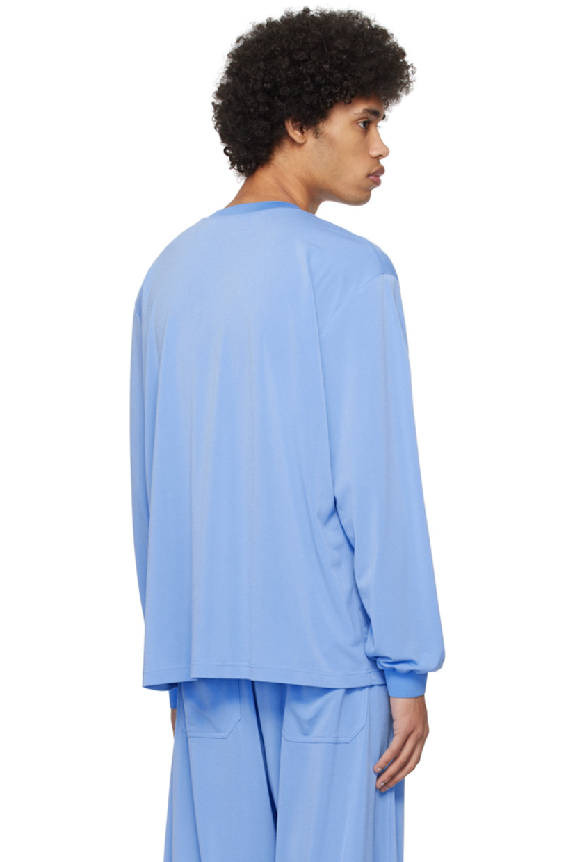 Stretch polyester crepe T-shirt. 

· Rib knit crewneck and cuffs 
· Logo embroidered at front
· Dropped shoulders

Supplier color: Sky blue