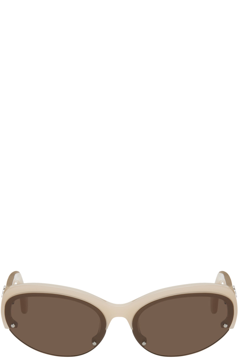 Oval semi-rimless acetate-frame sunglasses in beige.

�· Rivets at brown lenses
· Integrated nose pads
· Logo hardware at temples
· Includes pouch
· Size: 62.14 145

Supplier color: Sand brown