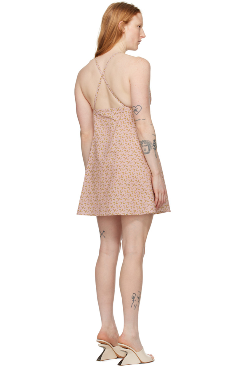 Plain-woven slub linen- and cotton-blend dress. Graphic pattern printed throughout. 

· V-neck 
· Logo hardware at criss-crossing shoulder straps 
· Concealed zip closure at back 

Supplier color: Pink/Yellow