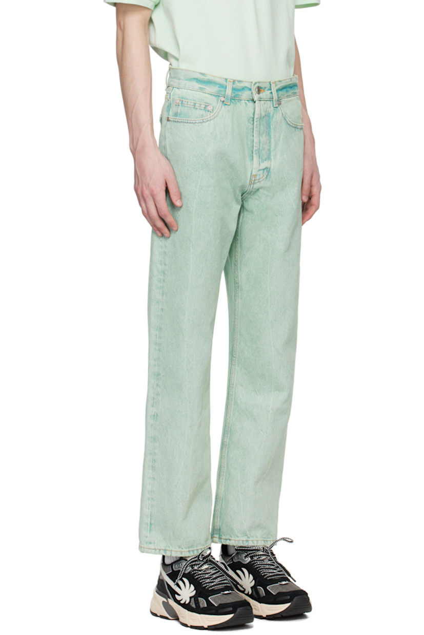 Overdyed non-stretch denim jeans. Fading and subtle distressing throughout. 

· Belt loops 
· Five-pocket styling
· Button-fly
· Logo embroidered at back pocket
· Logo-engraved silver-tone hardware
· Contrast stitching in tan 

Supplier color: Mint/Off-white