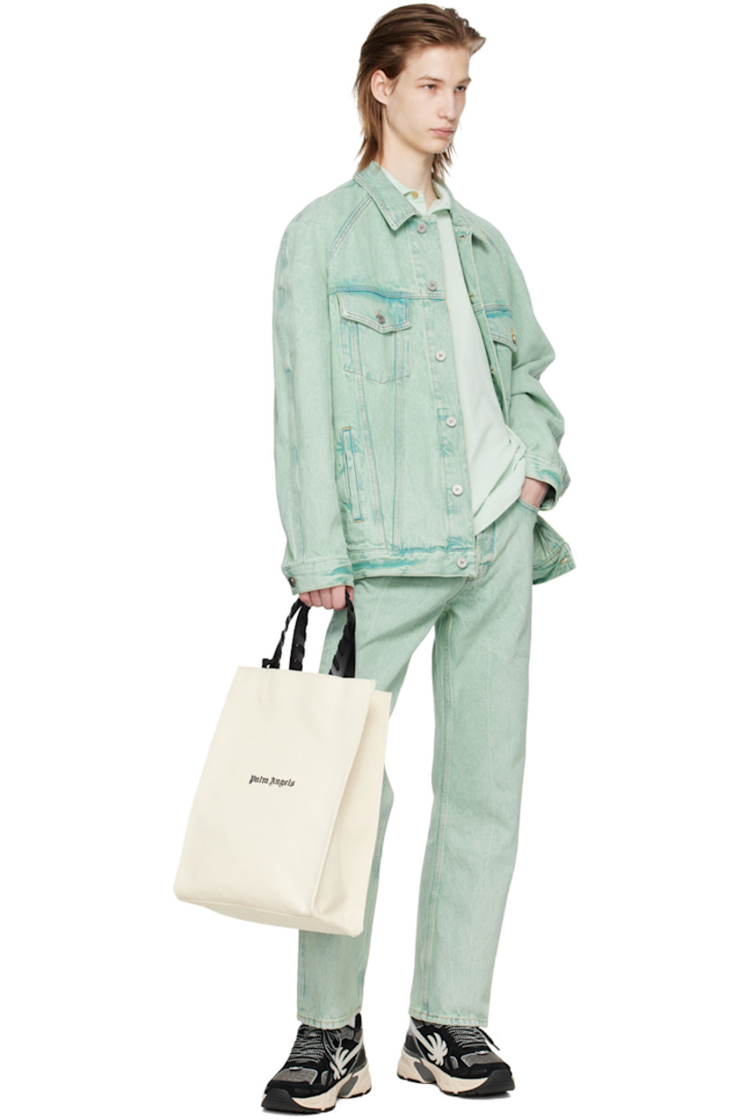 Overdyed non-stretch denim jeans. Fading and subtle distressing throughout. 

· Belt loops 
· Five-pocket styling
· Button-fly
· Logo embroidered at back pocket
· Logo-engraved silver-tone hardware
· Contrast stitching in tan 

Supplier color: Mint/Off-white