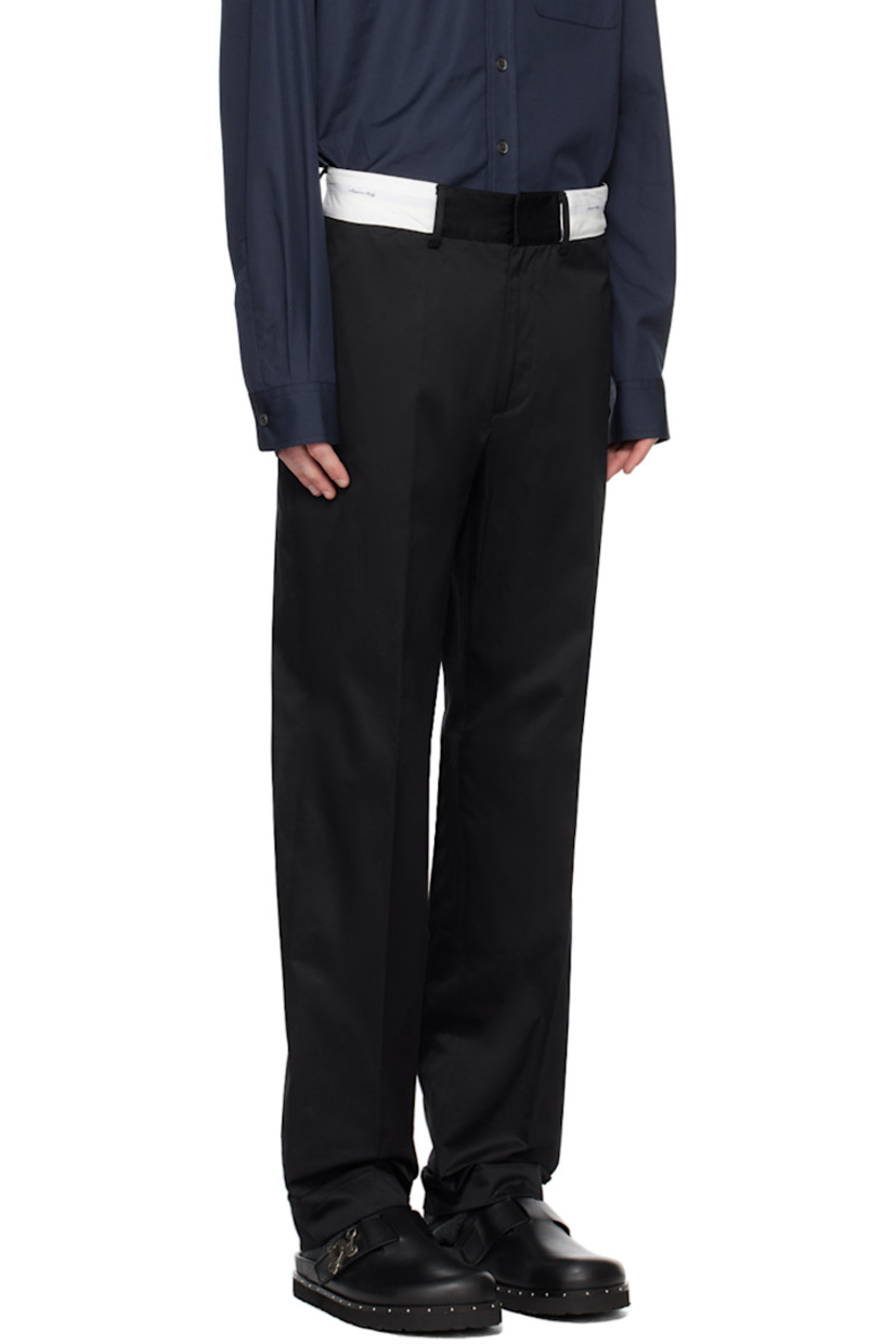 Cotton twill trousers. 

· Belt loops
· Text- and logo-woven trim at waistband 
· Four-pocket styling 
· Zip-fly
· Creased legs
· Logo printed at back waistband 

Supplier color: Black/Off-white