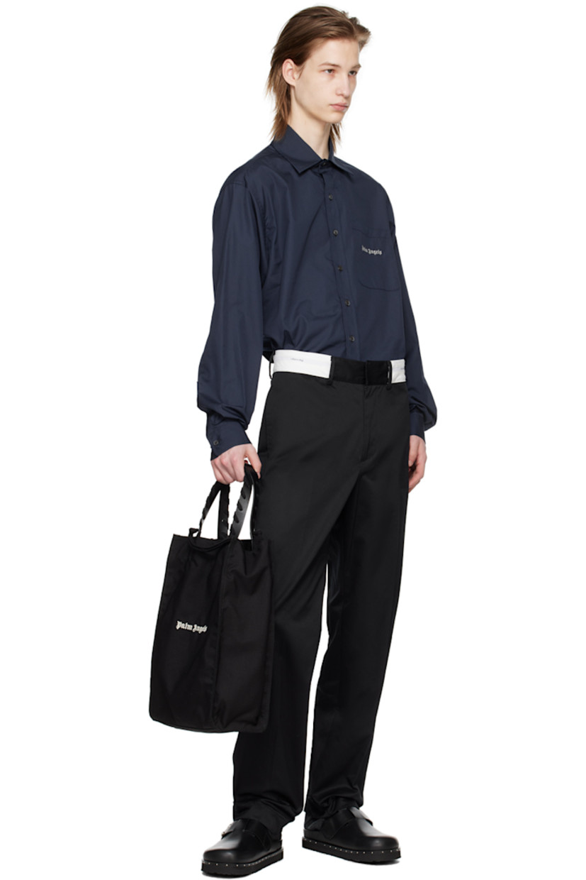 Cotton twill trousers. 

· Belt loops
· Text- and logo-woven trim at waistband 
· Four-pocket styling 
· Zip-fly
· Creased legs
· Logo printed at back waistband 

Supplier color: Black/Off-white