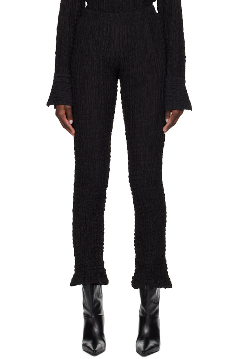 Flared textured stretch cotton-blend jersey leggings. Elasticized waistband.

Supplier color: Black