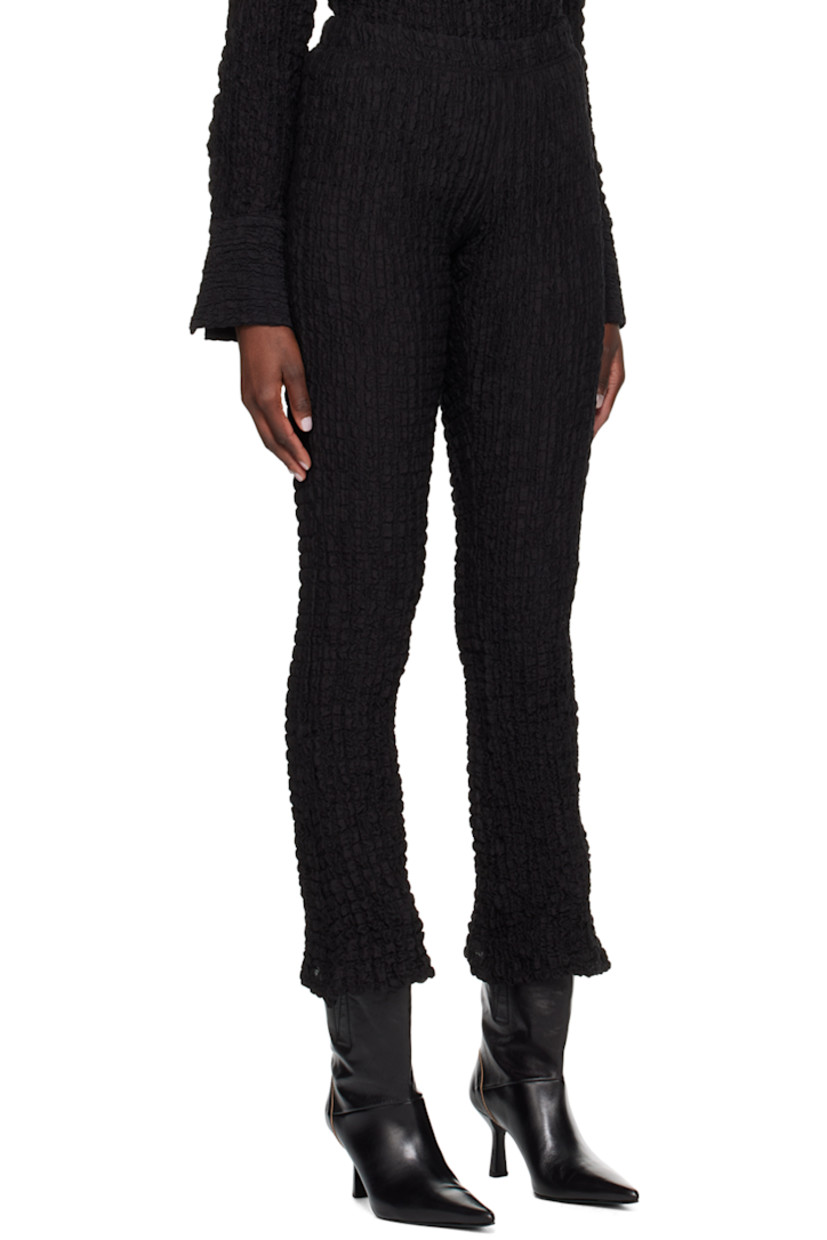 Flared textured stretch cotton-blend jersey leggings. Elasticized waistband.

Supplier color: Black