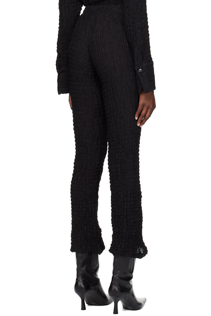Flared textured stretch cotton-blend jersey leggings. Elasticized waistband.

Supplier color: Black