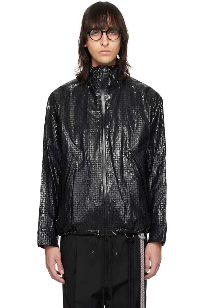 Polyurethane-coated cotton ripstop jacket. 

· Bungee-style drawstring at stand collar and hem
· Two-way zip closure
· Zip pockets at front
· Adjustable press-stud tab at cuffs
· Logo-engraved silver-tone hardware

Supplier color: Black