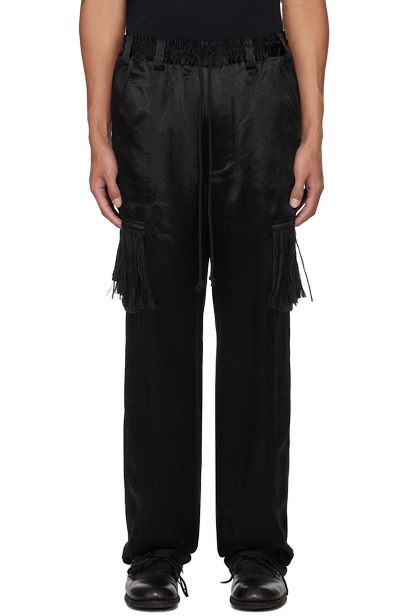 Acetate satin cargo pants.

· Belt loops 
· Drawstring at elasticized waistband
· Four-pocket styling
· Button-fly
· Cargo pockets at outseams
· Fringe detailing at cargo pockets
· Raw edge at cuffs
· Full twill lining

Supplier color: Black