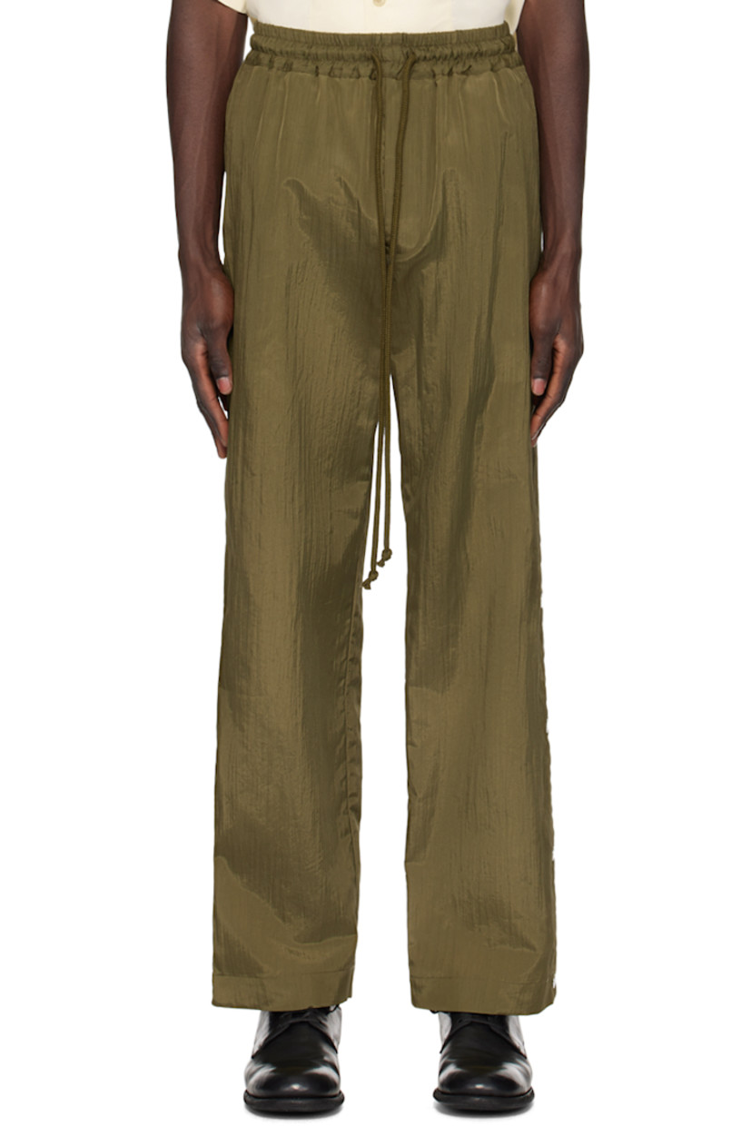 Coated nylon gabardine track pants. 

· Drawstring at elasticized waistband
· Four-pocket styling
· Button-fly
· Press-stud vent at outseams
· Logo-engraved silver-tone hardware

Supplier color: Khaki