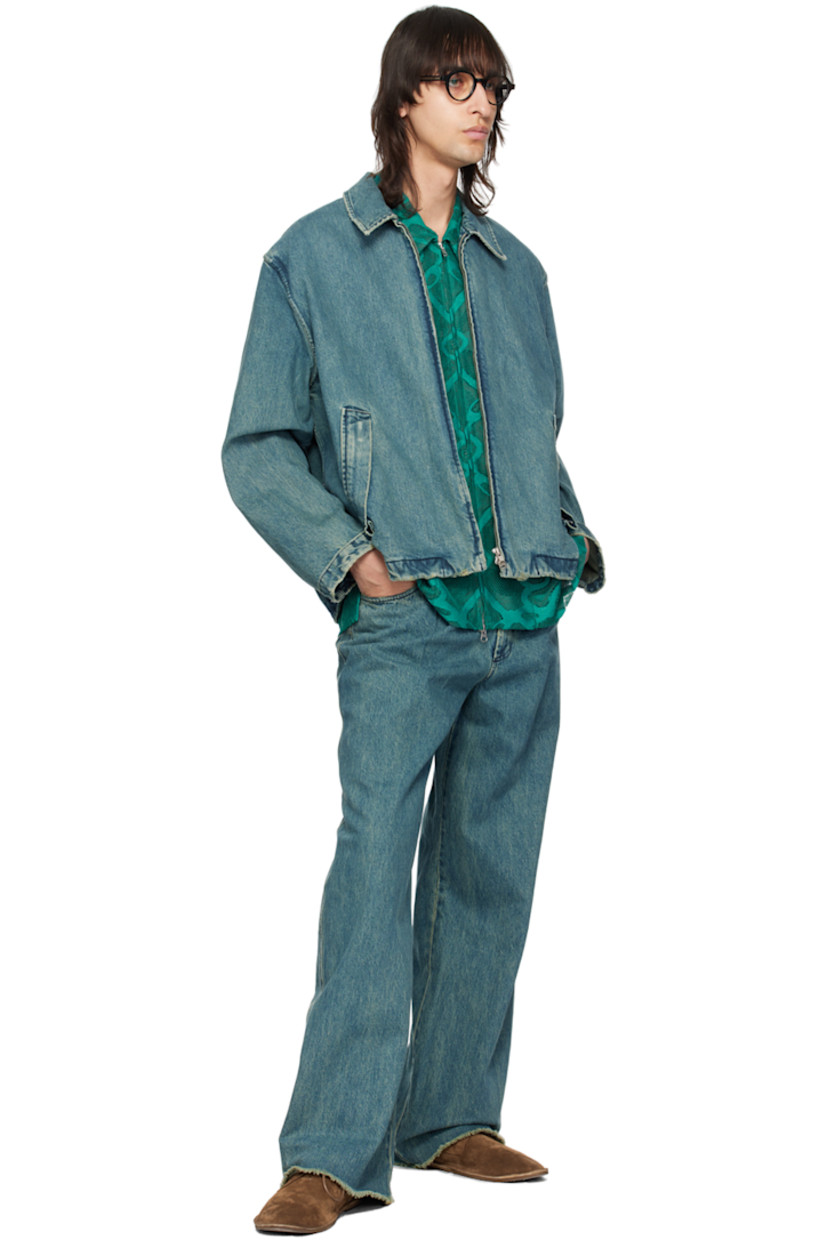 Semi-sheer polyester lace shirt. Graphic pattern embroidered throughout.

· Spread collar
· Two-way zip closure
· Patch pocket at chest
· Vented side seams
· Dropped shoulders

Supplier color: Peacock
