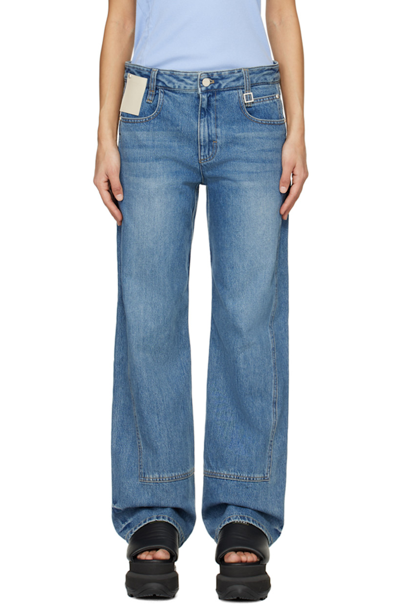 Straight-leg non-stretch denim jeans. Fading and whiskering throughout.

· Paneled construction
· Belt loops
· Logo hardware at waist
· Five-pocket styling
· Zip-fly
· Logo patch at front pocket and back waist
· Contrasting stitching in tan
· Logo-engraved silver-tone hardware

Supplier color: Blue