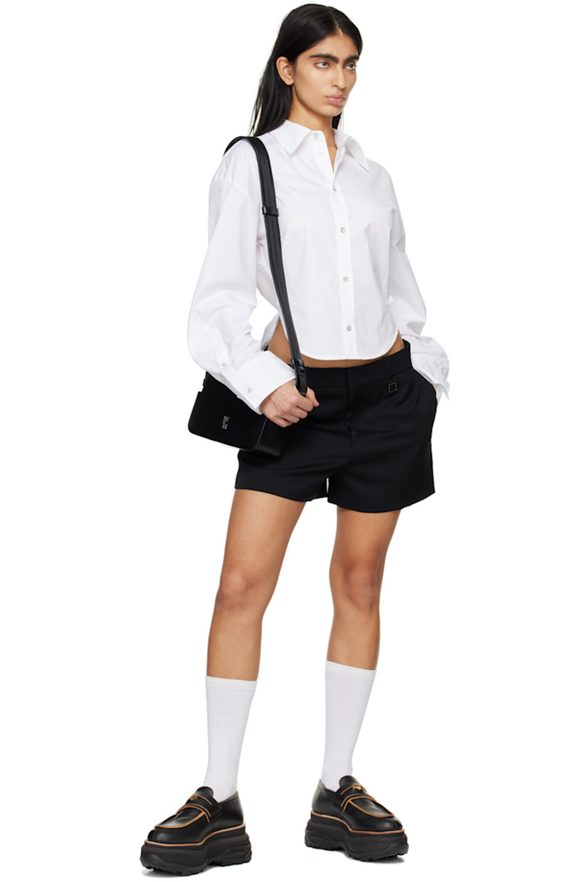 Wool twill shorts.

· Belt loops
· Four-pocket styling
· Zip-fly
· Adjustable cinch fastening at sides
· Creased legs
· Logo-engraved silver-tone hardware

Supplier color: Black