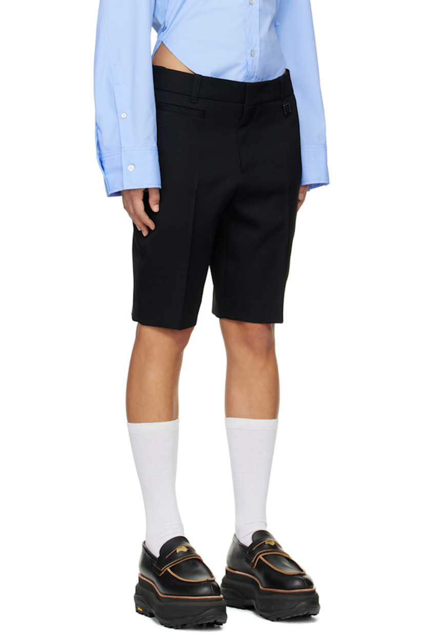 Wool twill shorts.

· Belt loops
· Logo hardware at front and back waist
· Five-pocket styling
· Zip-fly
· Creased legs

Supplier color: Black
