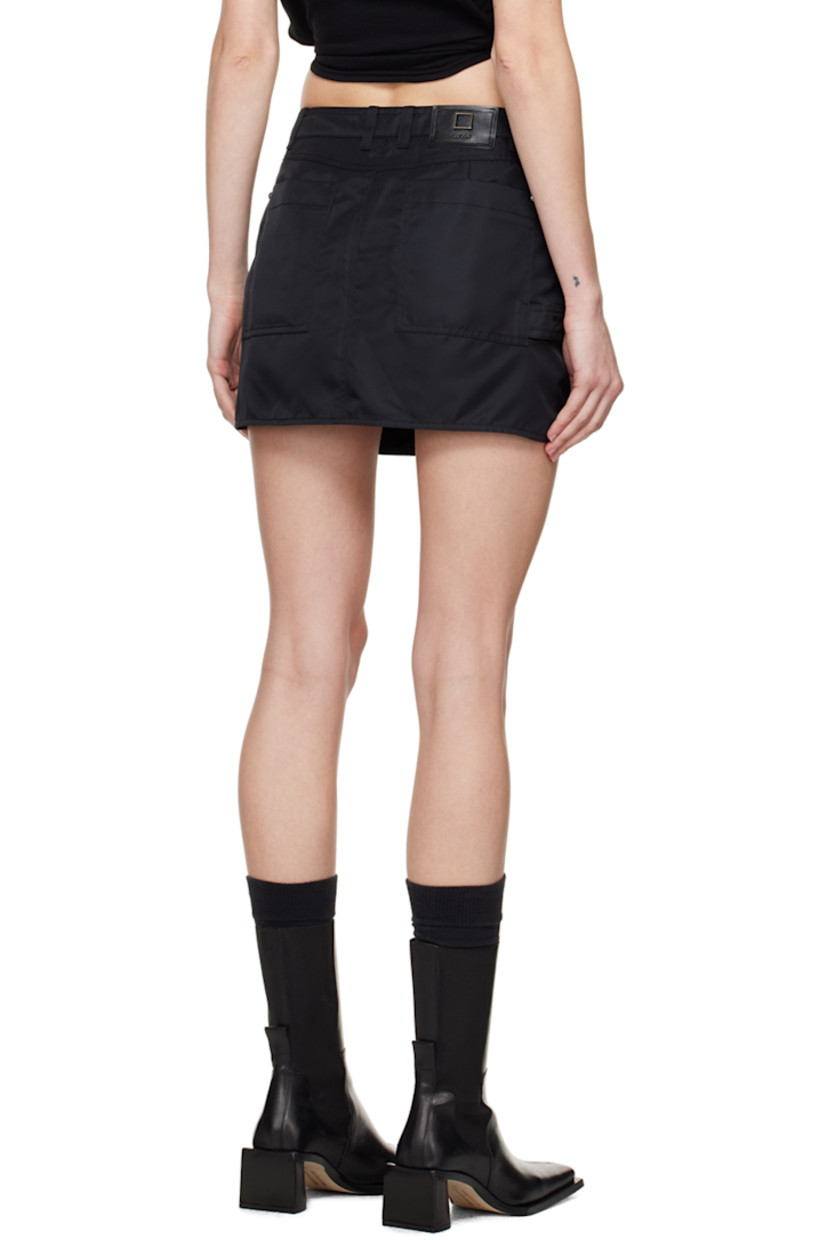 Nylon twill skirt. 

· Wrap construction
· Belt loops
· Logo hardware at front waist
· Five-pocket styling
· Vented side seams
· Leather logo patch at back waistband
· Full satin lining
· Logo-engraved gunmetal-tone hardware

Supplier color: Black