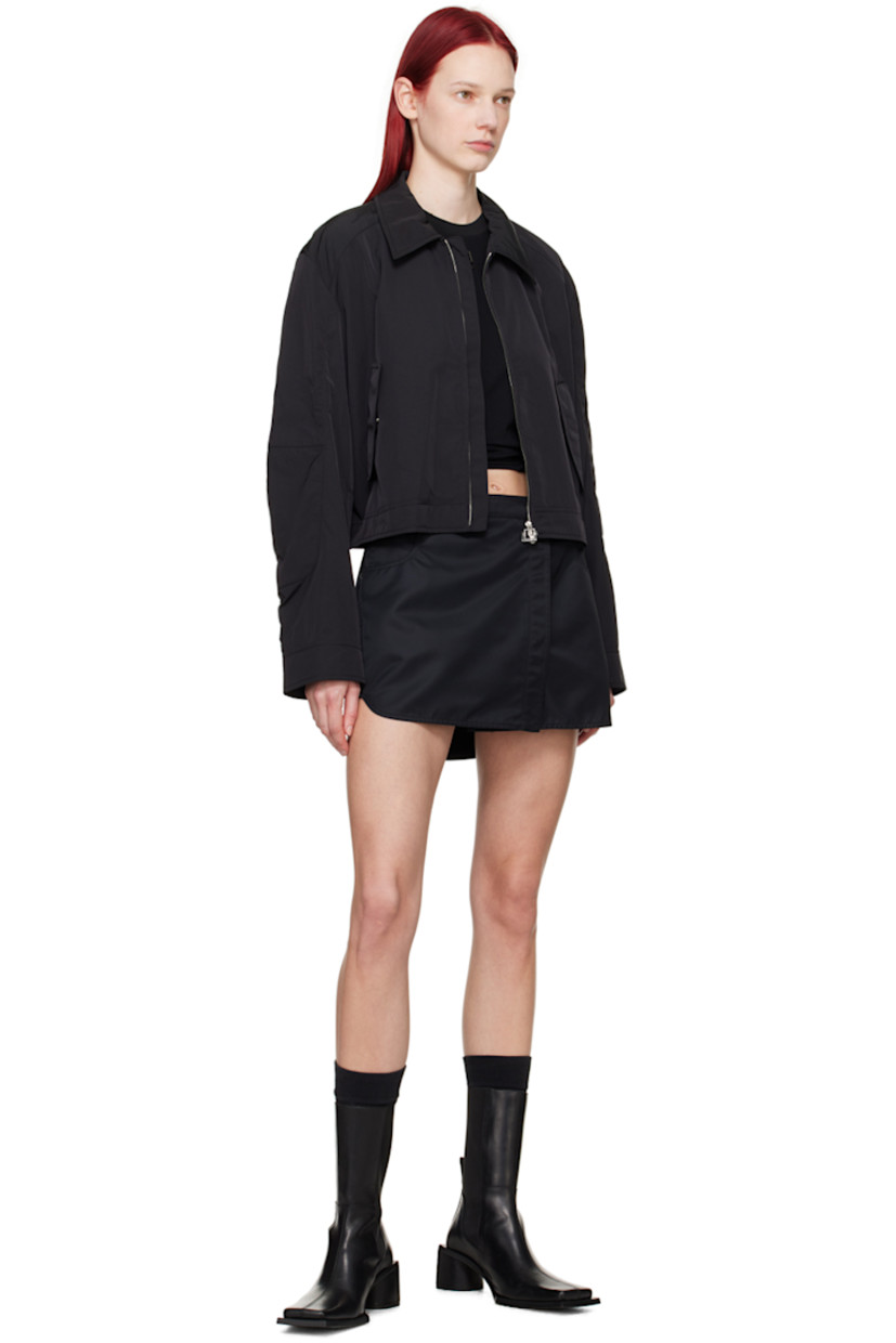 Nylon twill skirt. 

· Wrap construction
· Belt loops
· Logo hardware at front waist
· Five-pocket styling
· Vented side seams
· Leather logo patch at back waistband
· Full satin lining
· Logo-engraved gunmetal-tone hardware

Supplier color: Black