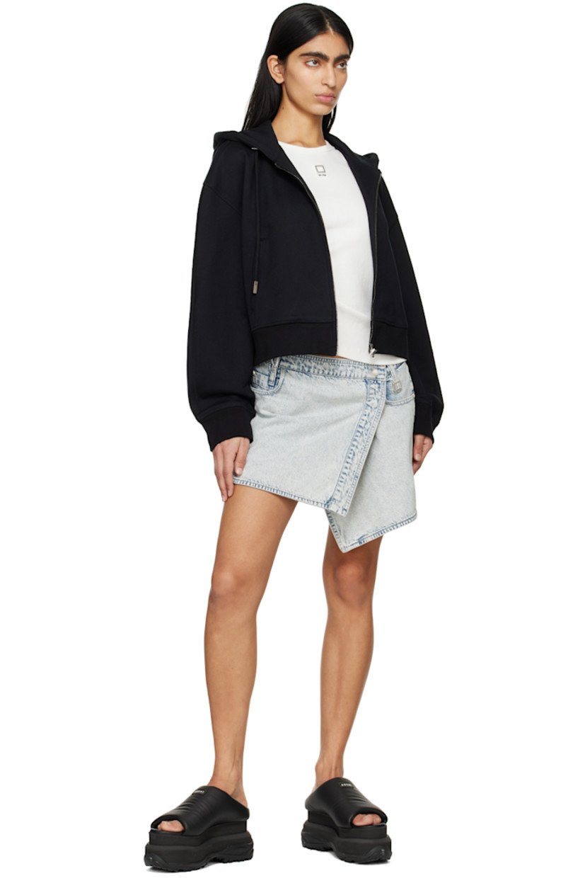 Non-stretch denim skirt. Fading throughout.

· Wrap construction
· Belt loops
· Logo hardware at waist
· Five-pocket styling
· Logo-woven loop at side seam
· Logo-engraved silver-tone hardware

Supplier color: Blue