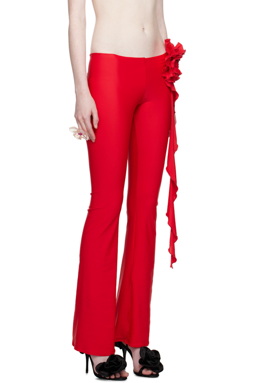 Stretch polyester jersey trousers. Floral appliqué with ruffled extended trim at front.

Supplier color: Red