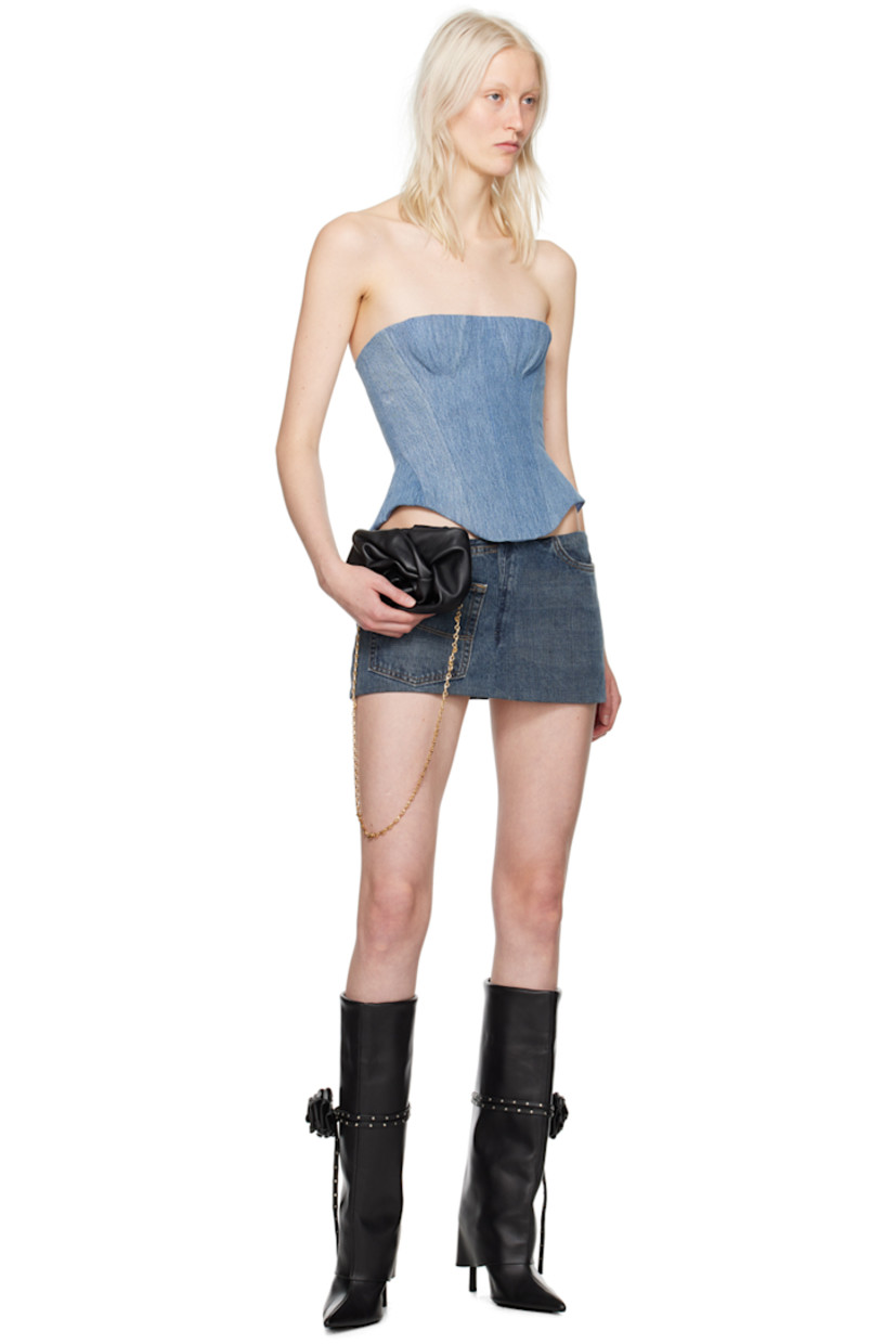 Non-stretch denim skirt. Fading and whiskering throughout.

· Four-pocket styling
· Concealed zip closure at side seam
· Logo flag at back pocket
· Full poplin lining
· Contrast stitching in tan

Supplier color: Denim
