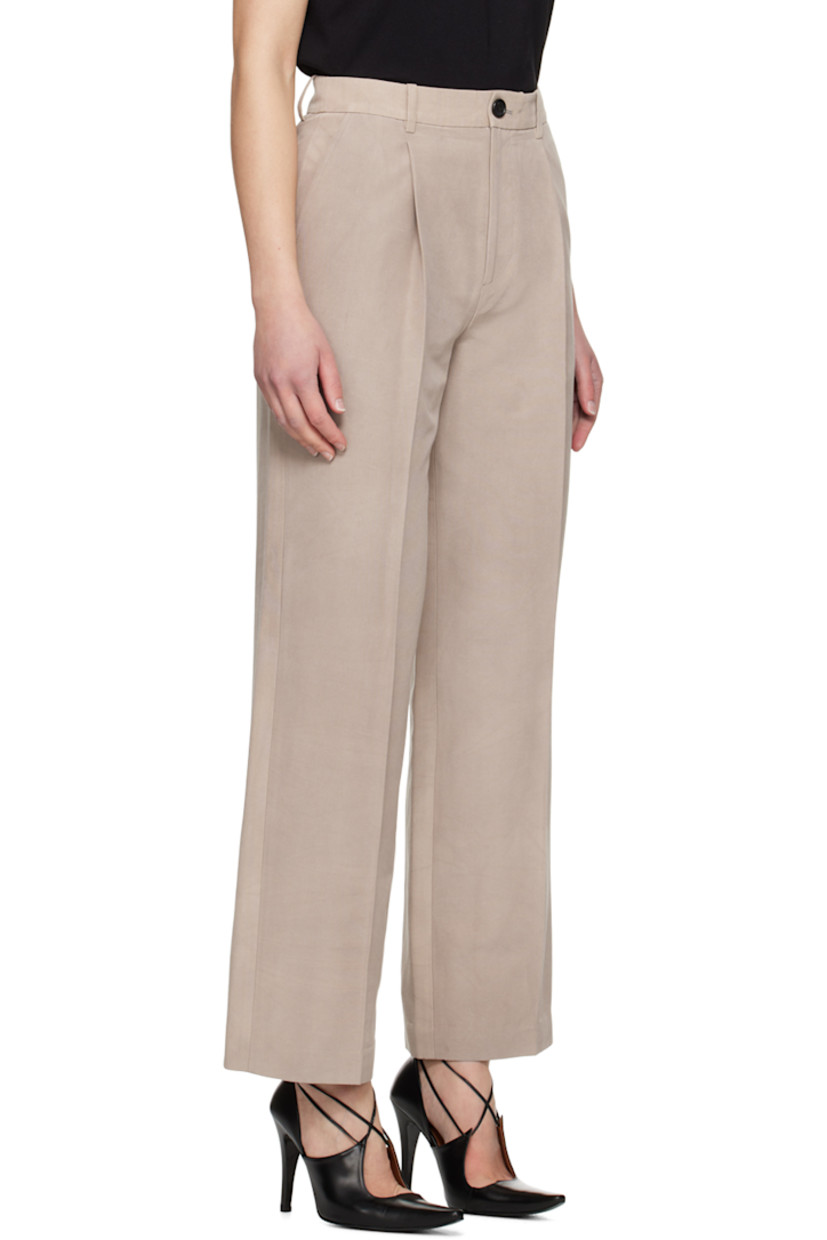 Hand-dyed cotton- and silk-blend faille trousers.

· Belt loops
· Four-pocket styling
· Zip-fly
· Pleats at front
· Creased legs

Supplier color: Beige