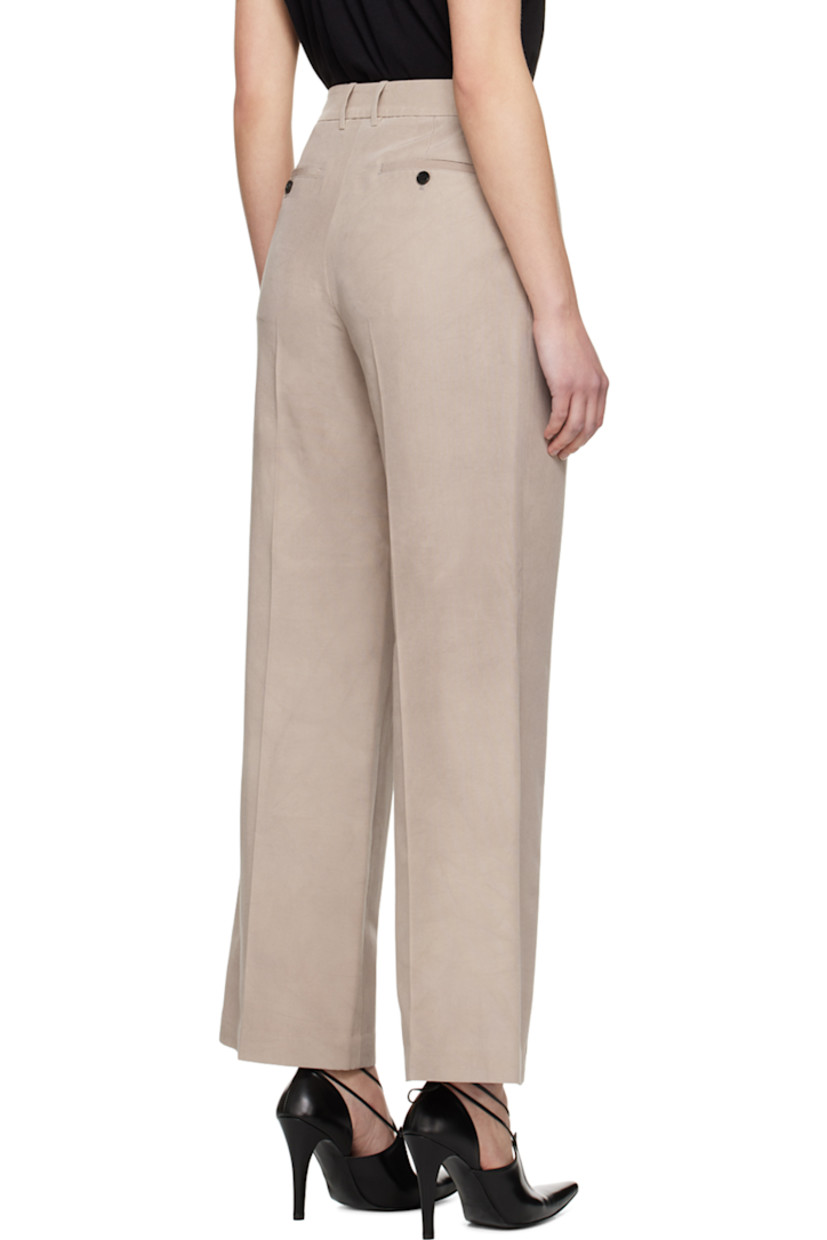 Hand-dyed cotton- and silk-blend faille trousers.

· Belt loops
· Four-pocket styling
· Zip-fly
· Pleats at front
· Creased legs

Supplier color: Beige