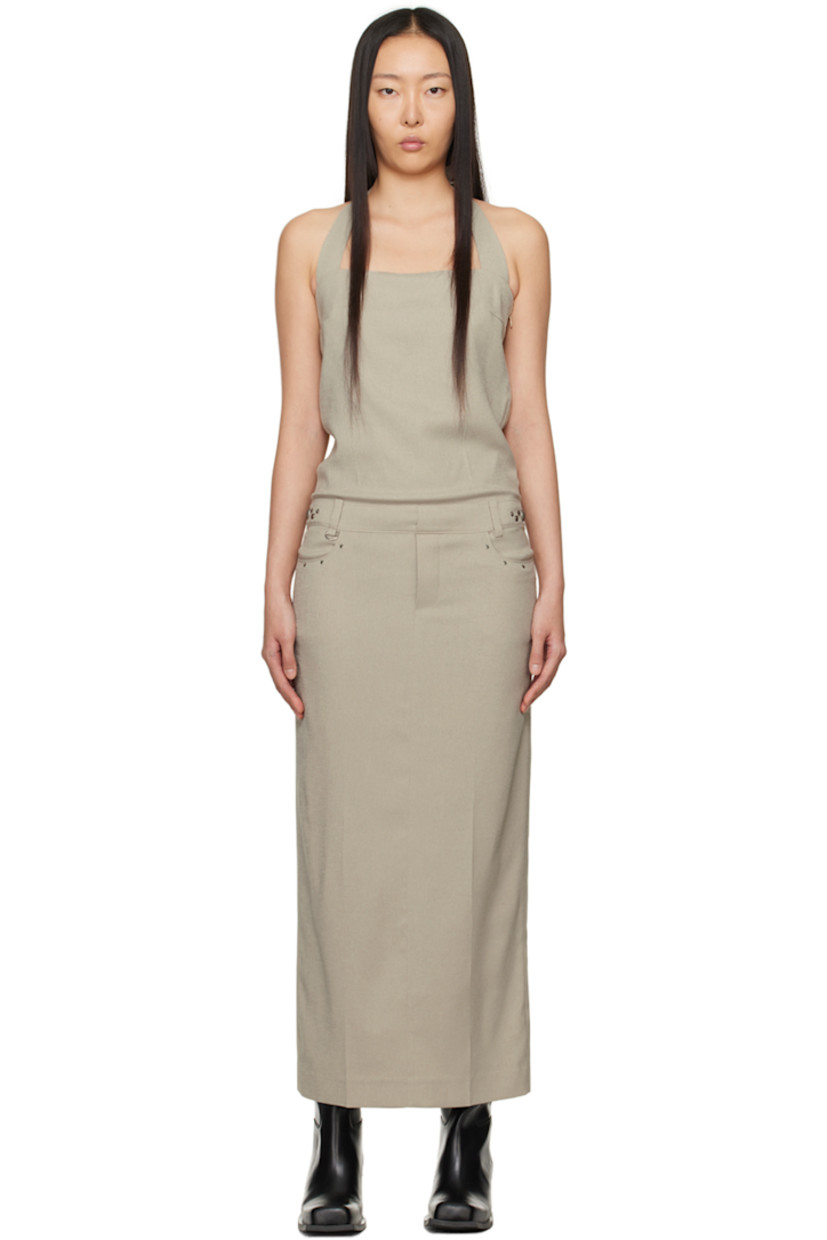 Stretch polyester canvas dress.

· Square neck
· Graphic hardware at front and side seams
· Belt loops and D-ring hardware at waist
· Welt pockets
· Mock-fly
· Self-tie halter straps
· Concealed zip closure at side seam
· Central vent at back hem
· Full poplin lining

Supplier color: Beige