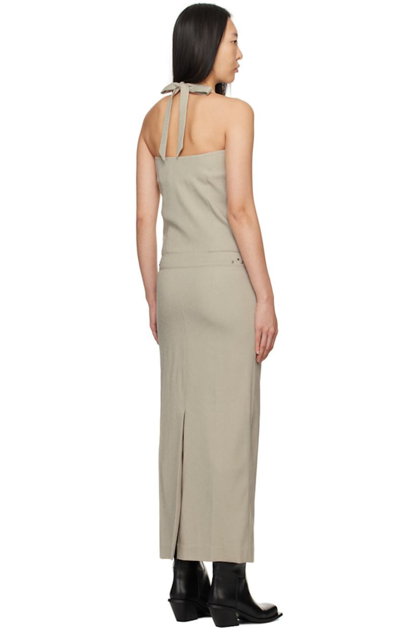 Stretch polyester canvas dress.

· Square neck
· Graphic hardware at front and side seams
· Belt loops and D-ring hardware at waist
· Welt pockets
· Mock-fly
· Self-tie halter straps
· Concealed zip closure at side seam
· Central vent at back hem
· Full poplin lining

Supplier color: Beige