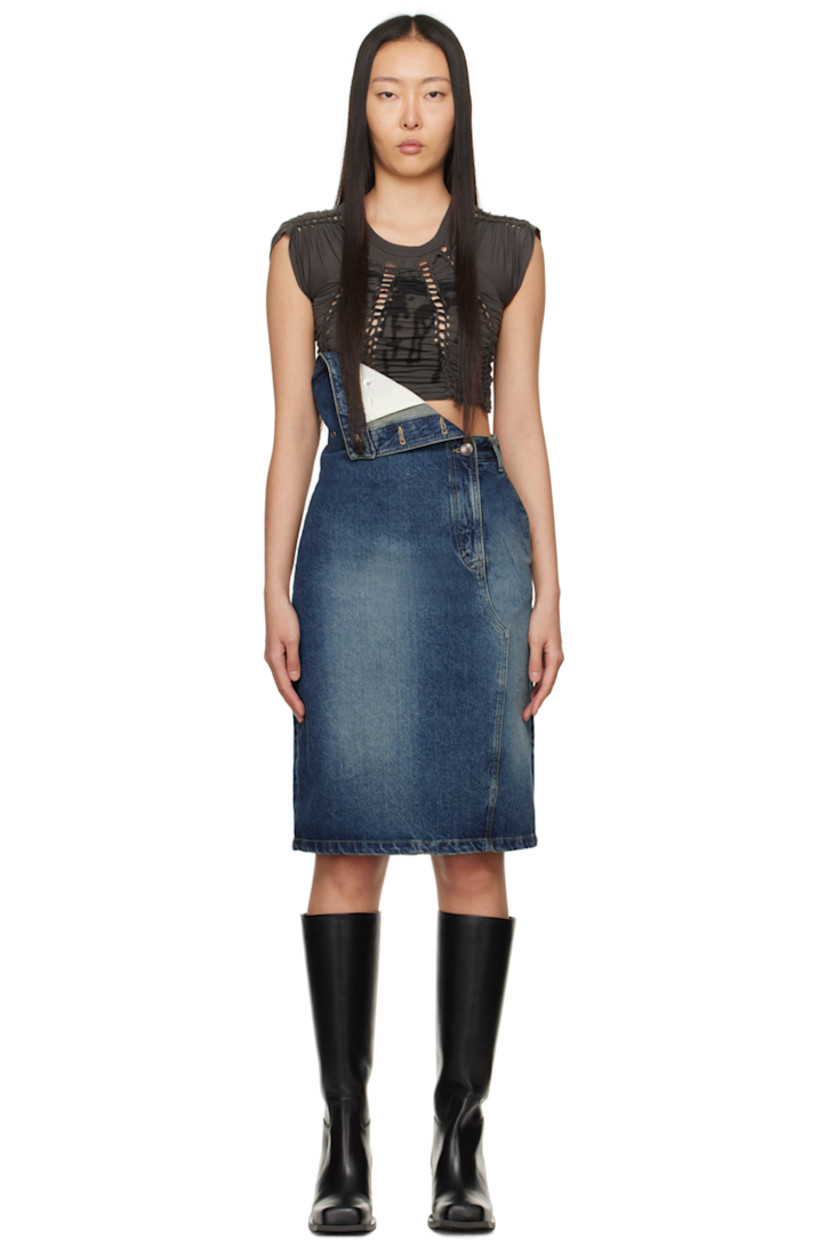 Non-stretch denim skirt. Fading throughout.

· Asymmetrical construction
· Belt loops at folded waistband
· Three-pocket styling
· Adjustable button fastenings at zip-fly for alternate styling
· Leather logo patch at back waistband
· Central vent at back hem
· Logo-engraved silver-tone hardware

Supplier color: Blue