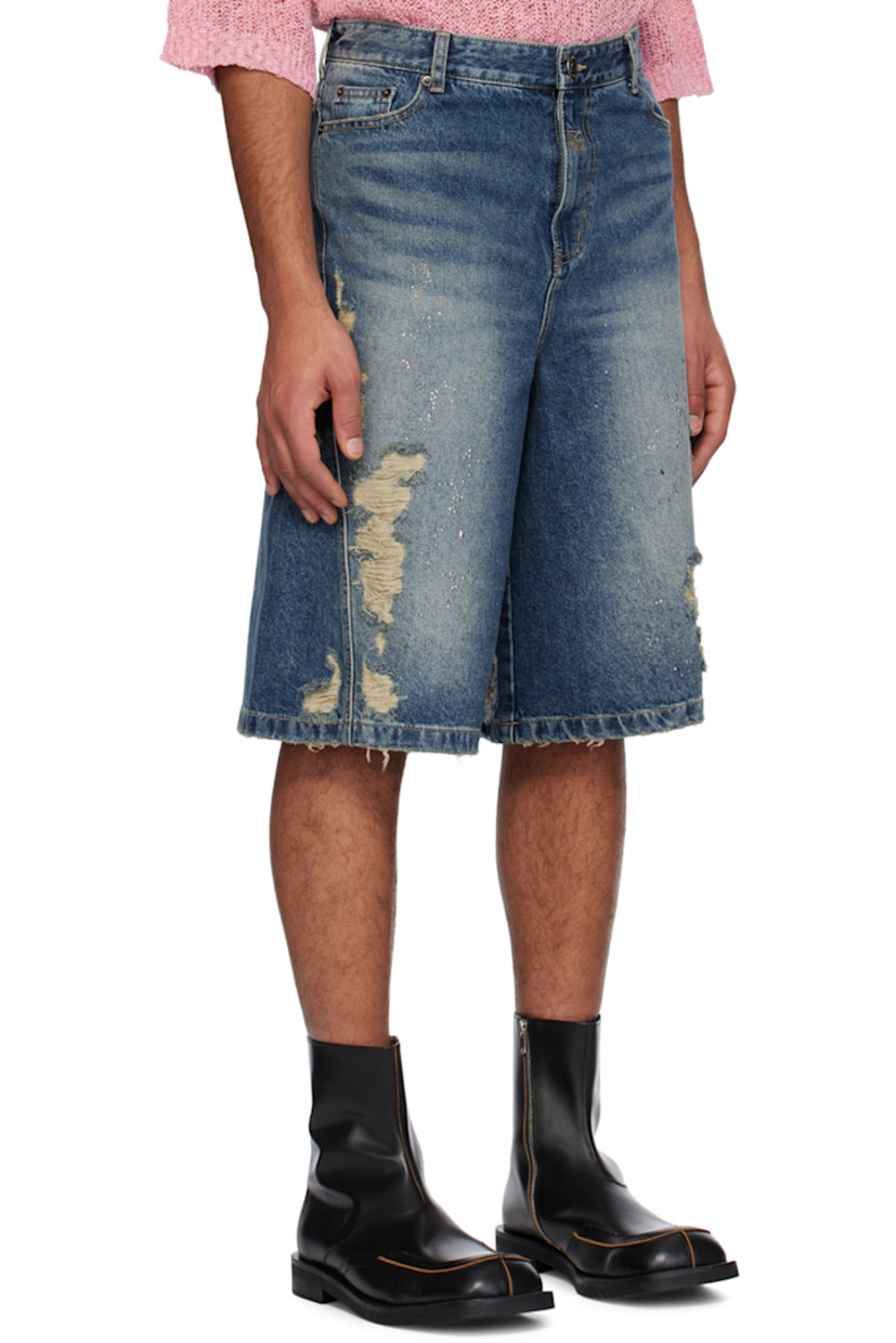 Non-stretch denim shorts. Fading, distressing, whiskering, and crystal-cut appliqués throughout.

· Belt loops
· Five-pocket styling
· Logo embroidered at zip-fly
· Leather logo patch at back waistband
· Logo-engraved gunmetal-tone hardware

Supplier color: Blue