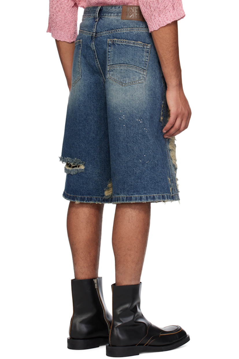 Non-stretch denim shorts. Fading, distressing, whiskering, and crystal-cut appliqués throughout.

· Belt loops
· Five-pocket styling
· Logo embroidered at zip-fly
· Leather logo patch at back waistband
· Logo-engraved gunmetal-tone hardware

Supplier color: Blue