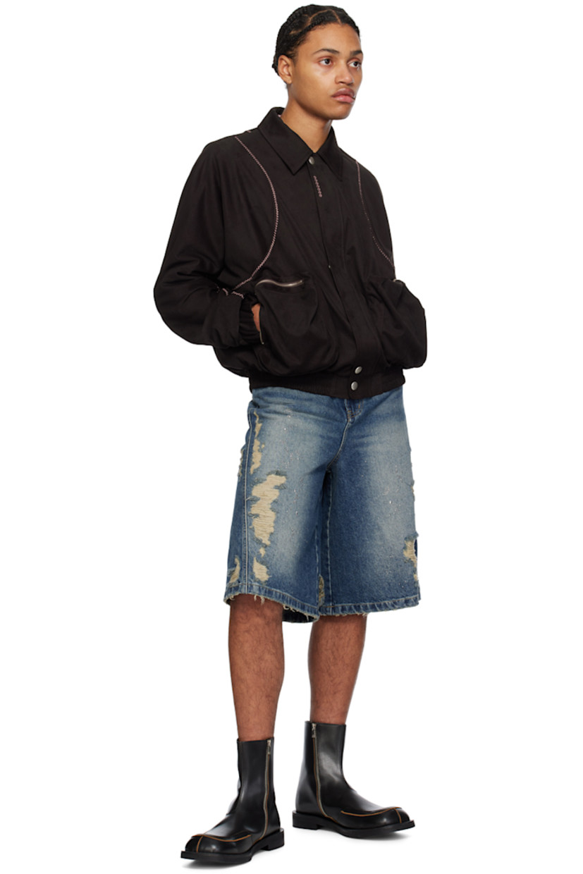 Non-stretch denim shorts. Fading, distressing, whiskering, and crystal-cut appliqués throughout.

· Belt loops
· Five-pocket styling
· Logo embroidered at zip-fly
· Leather logo patch at back waistband
· Logo-engraved gunmetal-tone hardware

Supplier color: Blue